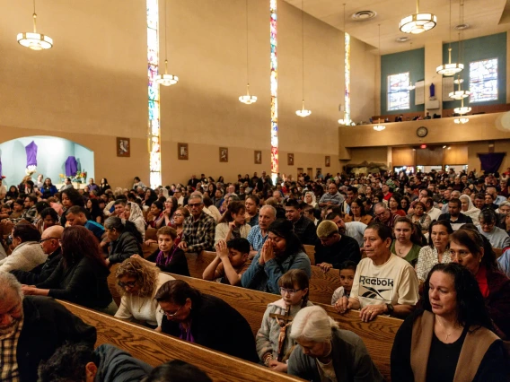 Standing-room-only Masses at one parish in Las Vegas draw about 1,200 people each, according to its pastor.Credit...Roger Kisby for The New York Times
