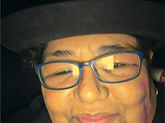 Image of Cindy Cruz, dark background 