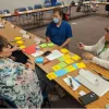 Arizona Prevention Research Center researchers meet with community action board members from El Rio Health. Every project at the center is done in collaboration with community health workers and community partners, locals who serve as a bridge between patients and their health care providers.